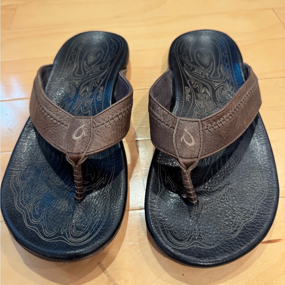 Men’s OluKai sandals (flip flops) . Beautiful leather. These are $140 new.